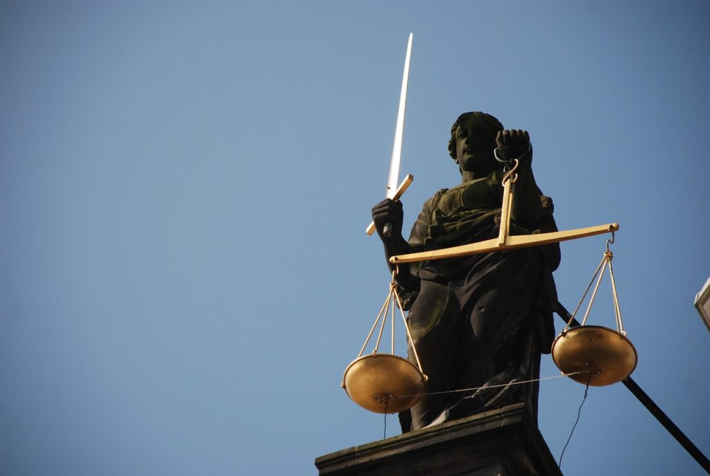 Lady justice holding scales and a sword